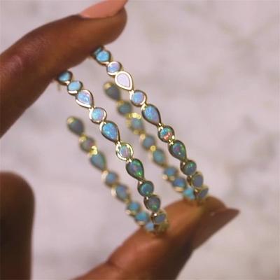 China Others 2022 Isla Opal Ring Earrings 24 Series And Special Teardrop Opal Earrings 18K INS Wind for sale