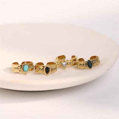 China CLASSIC Vintage Metal Concave Convex Ring Inlaid Turquoise Texture Stainless Steel Ring 14k Gold Ring for sale