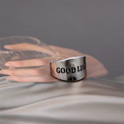 China CLASSIC Letter Good Luck Blackened Gold Titanium Steel Open Ring Men Engraved Stainless Steel Ring For Boy for sale