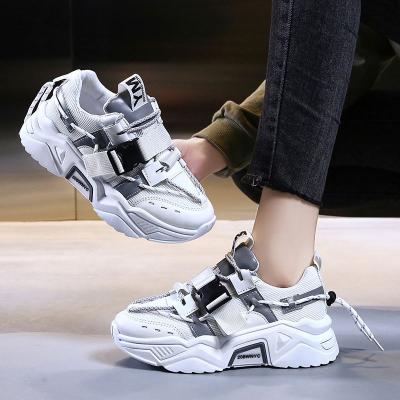 China CUSHIONING air sport shoes 2021 women fashion side release buckle sneakers lace up heels design high low shoes women platform casual shoes for sale