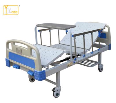 China Manual Hospital Bed 2 Cranks Adjustable Hospital Bed With Dining Table for sale