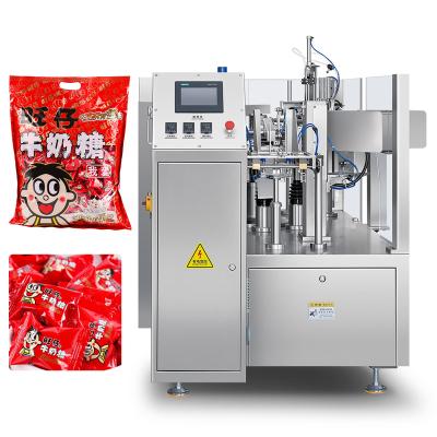 China Food Automatic Filling and Sealing Gummy Candy Snack Food Rotary Counting Bag in Bag Secondary Packaging Machine for sale