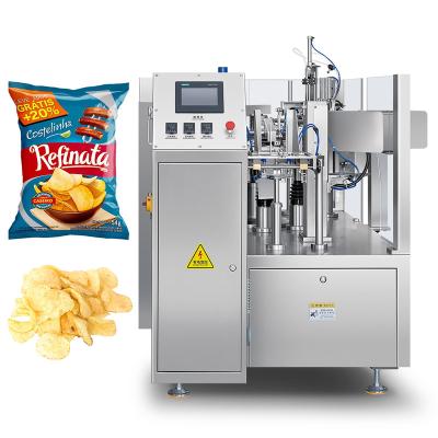 China Food Fully Automatic Multifunctional Rotary Pouch Packing Machine Nitrogen Filled Nuts Chips Snack Pouch Packing Machine for sale