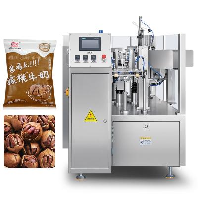 China Food Automated Grain Fast Packing Machine 50g 100g 200g 1kg 2kg Mini Doypack Packing Machine for Nuts Food for sale