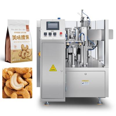 China Food Automated Food Packing Machine Zipper Seal Stand up Bag Nuts Food Stand up Pouch Packing Machine for sale