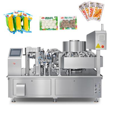 China Food Automatic Frozen Food Premade Bag Packing Machine Frozen Chicken Meat Bar Fish Ball Corn Food Vacuum Packaging Machine for sale