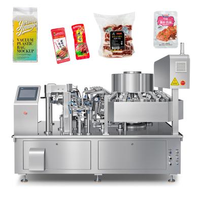 China Food Multi-function Rotary Food Bread Fruit Meat Packing Machinery Automatic Feeding and Vacuum Packing Machine for sale