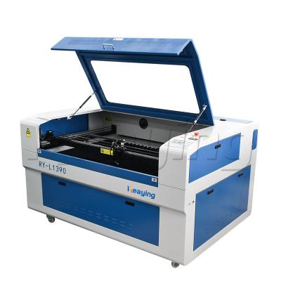 China Laser Engraving Laser Engraving Machines 960 1390 1610 CO2 Laser Cutting Machines For Advertising for sale