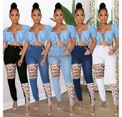 China Z0855 2021 Latest Color Breathable Sheer Hollow Out High Waist Casual Jeans Hole Pants Womens Denim Pants Lattice for sale