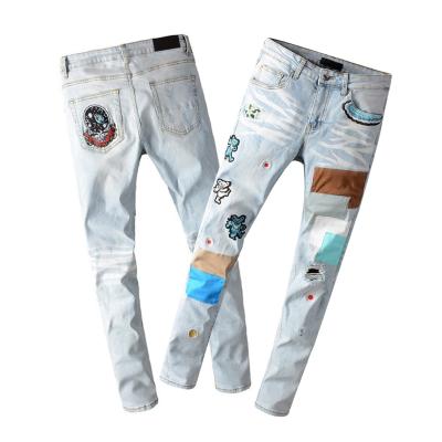 China Z0901 QUICK DRY casual jeans distressed bleached ripped denim pants European and American fashion men's jeans for sale