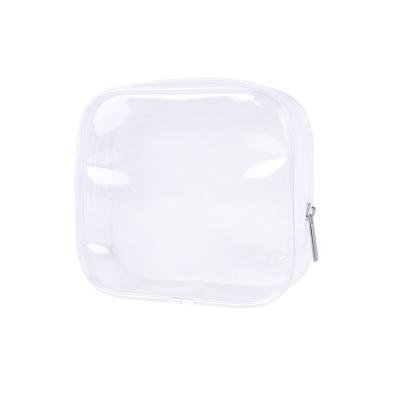 China Custom Biodegradable Waterproof Clear Transparent Transparent Makeup Pillow Window Toiletry Travel Logo PVC Cosmetic Bag for sale