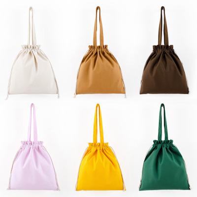 China 100% New Arrival 12Oz Cotton Eco-Friendly Drawstring Empty Canvas Tote Bags Beach Colorful Plain Draw String Cotton Canvas Bag for sale