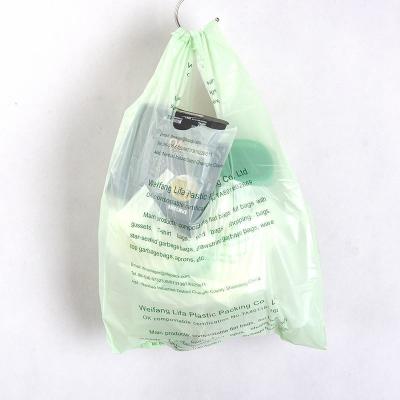 China Impresión de camisetas biodegradables Embalaje de compras Bolsas de plástico con mango para el supermercado en venta