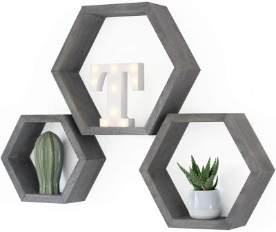 China Hexagonal Three-piece Living Room Shelf Minimalist Creative Wall Shelf Wooden Wall For Home Decoration for sale