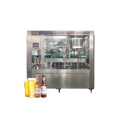 China Wine Automatic Carbonated Drinks Beer Food Glass Bottle Liquid Bottling Filling Machine With Crown Cover for sale