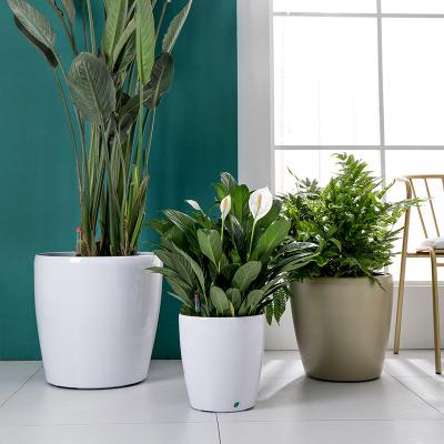 China Yizhitang Contemporary Decorative Plant Pots Indoor Self Watering Around Planter Stand Flower Bonsai Plastic Pot for sale