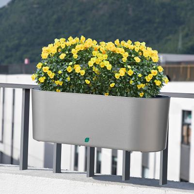 China Contemporary Wall Hanging Flower Pot Self Watering Garden Succulent Planter Plastic Flower Pot for sale