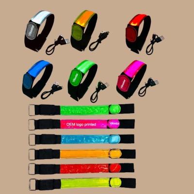 China Fast flash logo printed rechargeable led flashing changing colors festival events concert party night running wristband glowing bracelet for sale