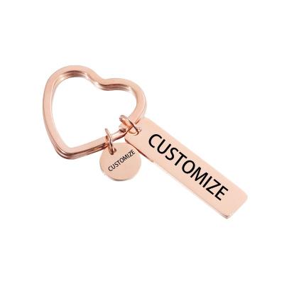 China Fashionable Personality Laser Name Logo Text Keychain Stainless Steel Heart Mute Key Chains For Women Car Jewelry Fashion Gifts for sale