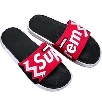 China Summer trend of letter Anti-slippery men's fashion slippers use comfortable thick-soled flip-flop couple sandals and slippers home slippers for sale