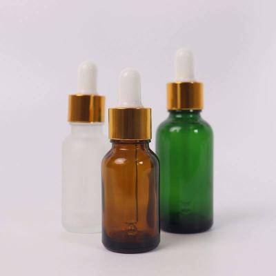 China New Product 10Ml 15Ml 30Ml 50Ml 100Ml Cosmetic Luxury Hair Dropper Bottle Gold Essential Oil Glass Bottles for sale