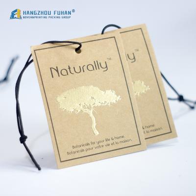 China New Design Tree Wrapping Paper Gold Stamped Sustainable Apparel Hang Tag With Waxed String for sale