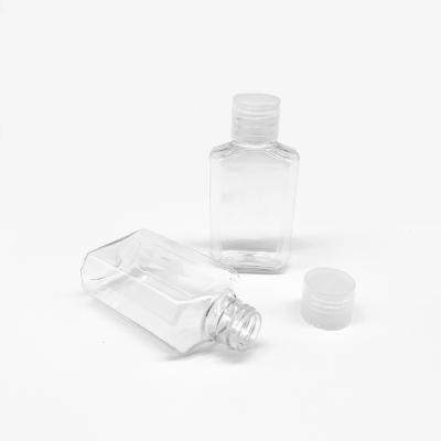 China Household products in stock 50ml 60ml PET plastic bottle empty alcohol gel sanitizer container for sale