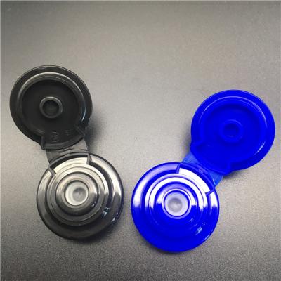 China Non Spill 28mm Plastic Flip Top Cap With Food Grade Silicon Valve for sale