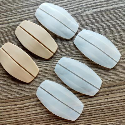 China Comfortable Clear Skin Color Silicone Pain Relief Shoulder Pads Silicone Bra Strap Pad for sale