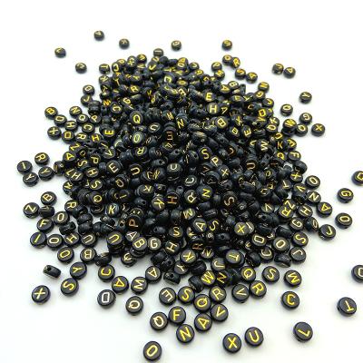 China Lovely Children's Educational Toys Letter Pendant 4*7mm Golden Black Flat Round Plastic Acrylic Alphabet Beads for sale