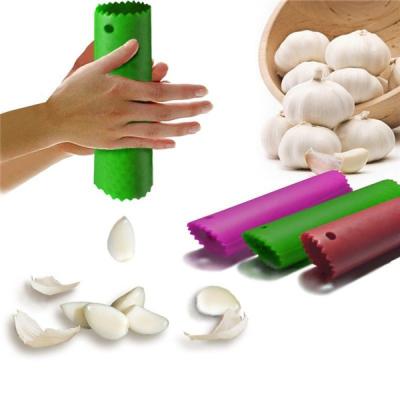 China Silicone Garlic Viable Hot Magic Skin Peeler Easy Useful Kitchen Tools Colorful for sale