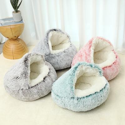 China Sustainable Luxury Dog Cat Bed Long Fur Warm Round Plush Calming Cuddler Donut Beds Cushion Cat Nest Fluffy Pet Cave Bed Manufacturer for sale