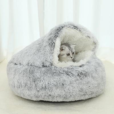 China Sustainable Wholesale Faux Fur Plush Round Soft Donut Cat Bed Pet Cave Products for Pets Sleep Cozy House Cats Accessories for sale