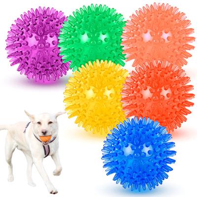 China Dogs Most Popular Bite Resistant Squeaky Pet Toy Dog Ball Training Spikes Teeth Cleaning Squeaky spiky ball for sale