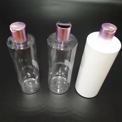 China 150ml 200ml 250ml 300ml 400ml 500ml PET round cyclinder cosmetic flat shoulder empty shampoo bottle for sale