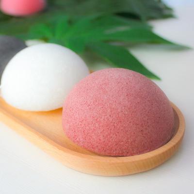 China All Natural Manufacturer direct selling spot hemispherical black konjak face wash konjak sponge powder puff cleansing ball for sale