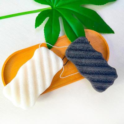 China All Natural Unique Design Wave Shape Walnut Shell Natural Konjac Sponge Cleansing for sale