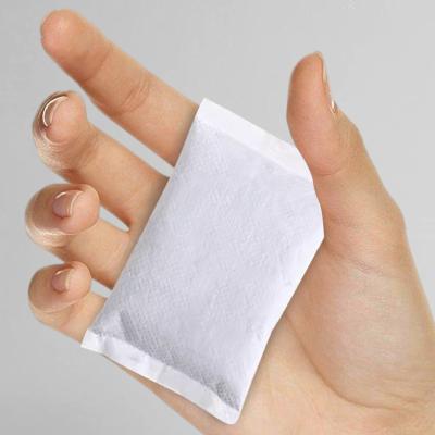 China Hand 12 hours portable disposable instant heating warmer pad hand heat pack fish for sale