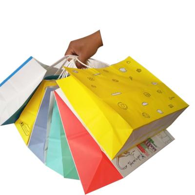 Китай Disposable Packaging Bags Custom Logo Printed White Paper Packing Shopping Bags With Handle продается