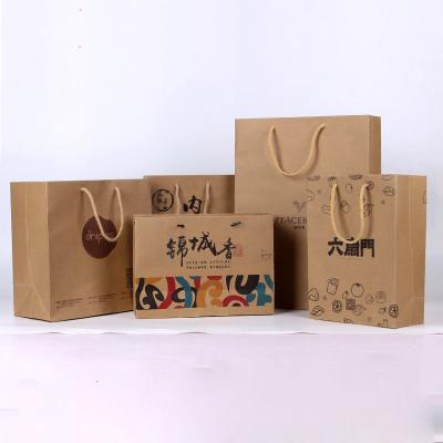 China Disposable Brown Sticker Custom Printed Paper Bags Handles Kraft Paper Bag With Handle en venta