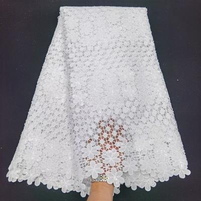 China Sustainable White Embroidery Cavity African Water Soluble Lace Fabric For Women Dress for sale