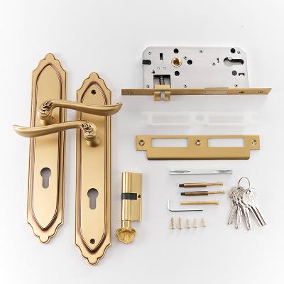 China Modern wholesale brass gold door lock handle set factory china entry use for main door for sale