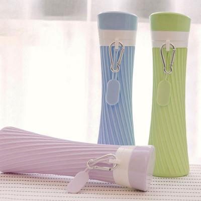 China 2023 new silicone creative water cup travel shape stored folding portable folding water bottle for sale