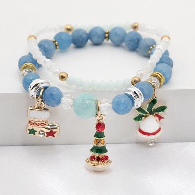 China 2020 Cute New Christmas Handmade Bracelet Jewelry Gift Natural Stone Beads Bracelets With Christmas Tree Bell Glaze To Dangle Charms 2 Pcs Set for sale