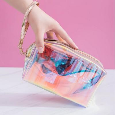 China New Fashion Laser Bulk Cosmetic TPU Bags Transparent Waterproof Wash Bag With Zipper Holographic Beauty Makeup Bag For Travel Toiletry for sale