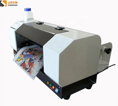 China Garment Shops R1390 DX5 Head DTF Pet Movie T-shirt Printer With DTF Textile Dye Ink for sale