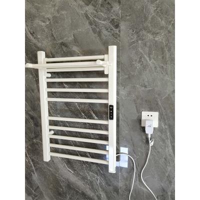 China Heater Bathroom Stainless Steel Electric Heated Towel Rail Electric Towel Warmer With Time for sale