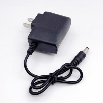 China Custom LED Indicator Wall Adapter Black EU USA Plug AC to DC 5.5 x 2.1 mm DC Power Adapter Charger with Charging Indicator for sale