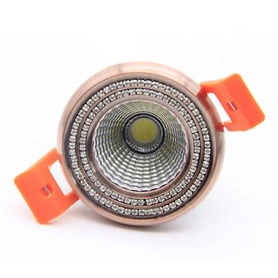 China Modern adjustable direction round 5w cool white cob led spot downlight with crystal for sale