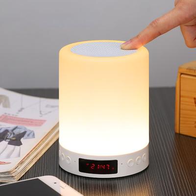 China Modern Creative Wireless Light Touch Switch Night Alarm Clock Speaker Music Night Light for sale